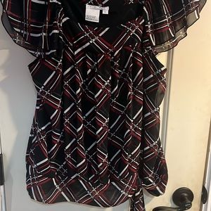 Women’s Petite Dressy blouse with cap sleeve tye at waist.